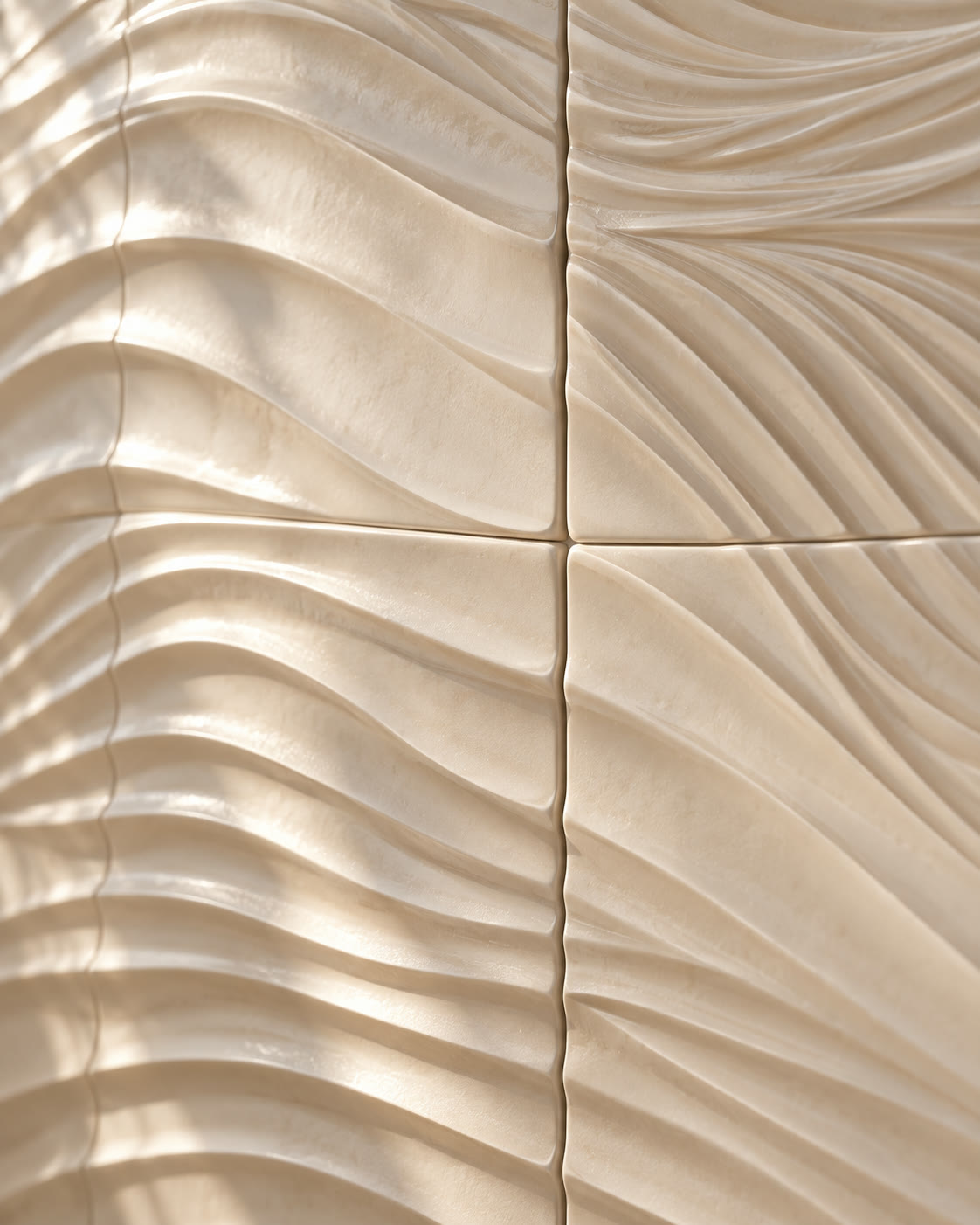 A close study of ivory ceramic relief, fine layered texture and glaze highlights